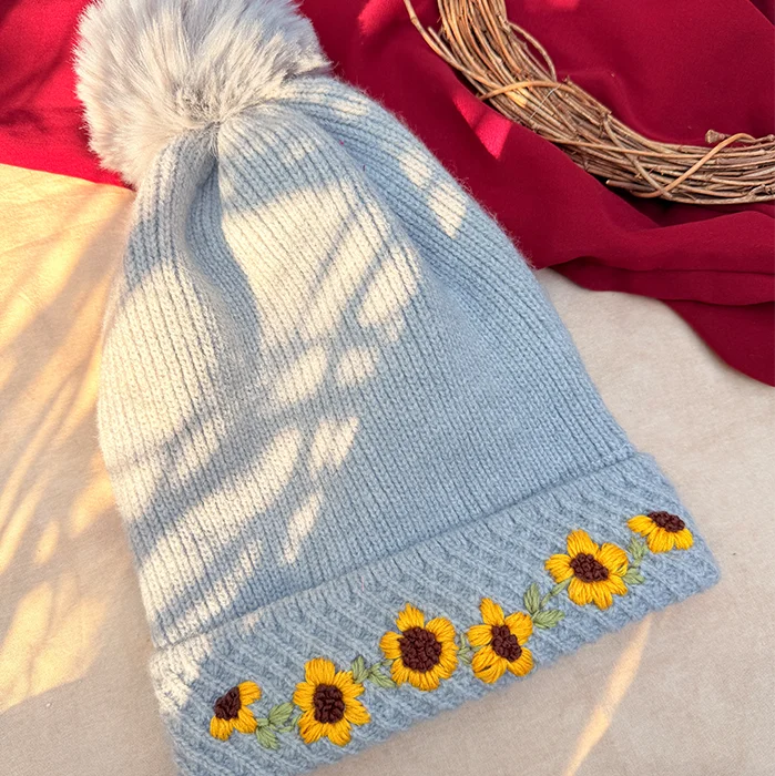 Winter Sunflower Hand-Embroidered Knit Cap with Fluffy Pom-Pom