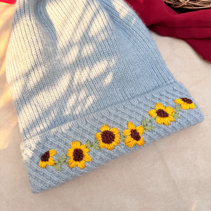 Winter Sunflower Hand-Embroidered Knit Cap with Fluffy Pom-Pom