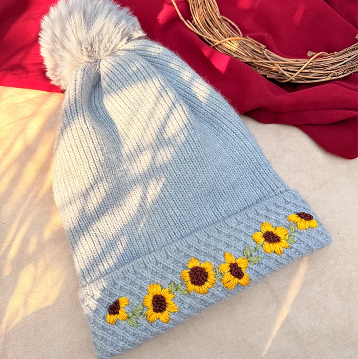 Winter Sunflower Hand-Embroidered Knit Cap with Fluffy Pom-Pom