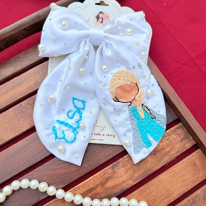 Elsa – Hand Embroidered White Bow Hair Accessory with Pearl Detailing