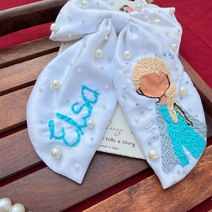 Elsa – Hand Embroidered White Bow Hair Accessory with Pearl Detailing