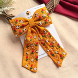 Mustey Yellow Hand Embroidered Floral Bow Hair Clip