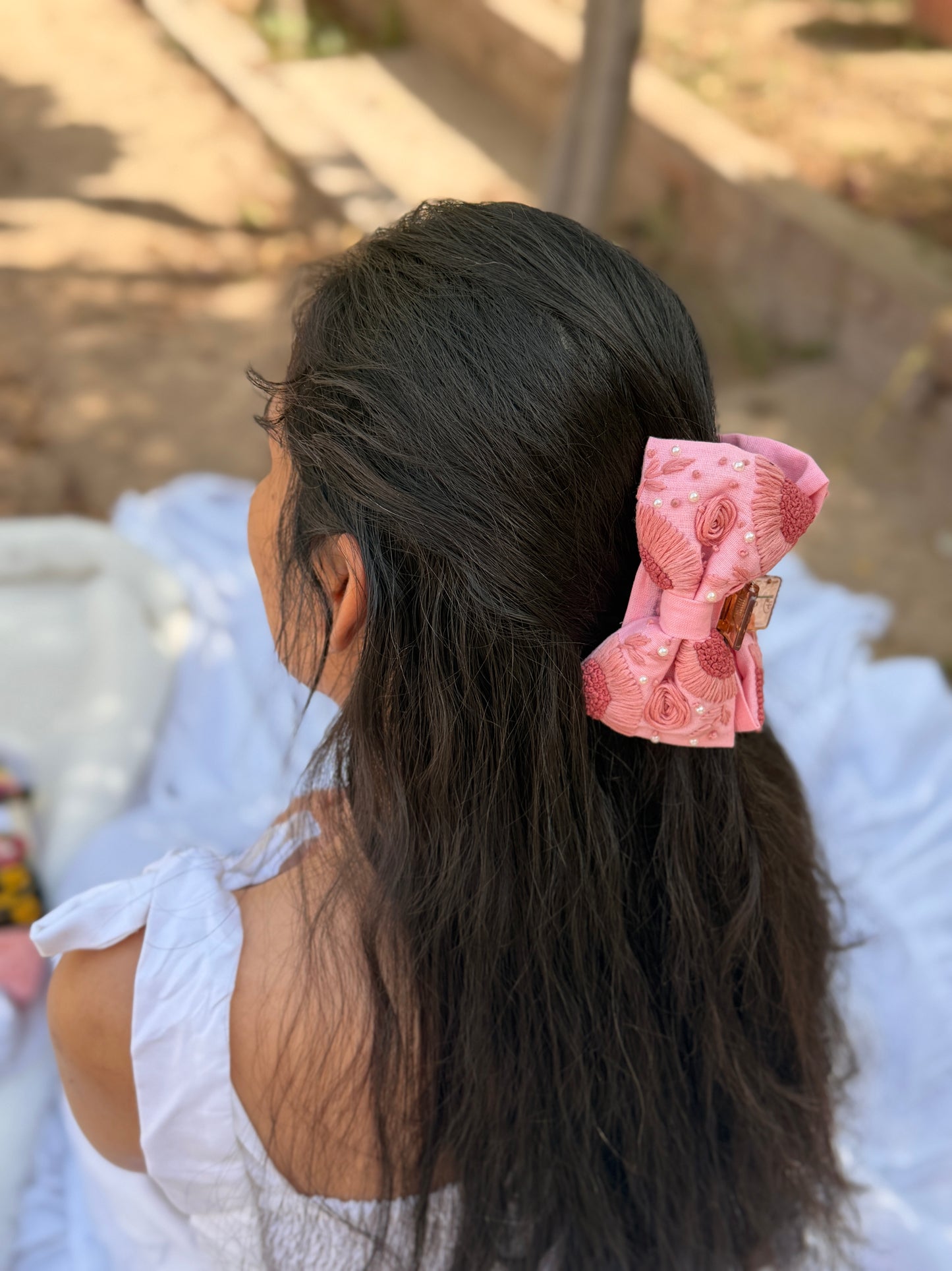 Roshni’s Hand Embroidered Clutcher Bow