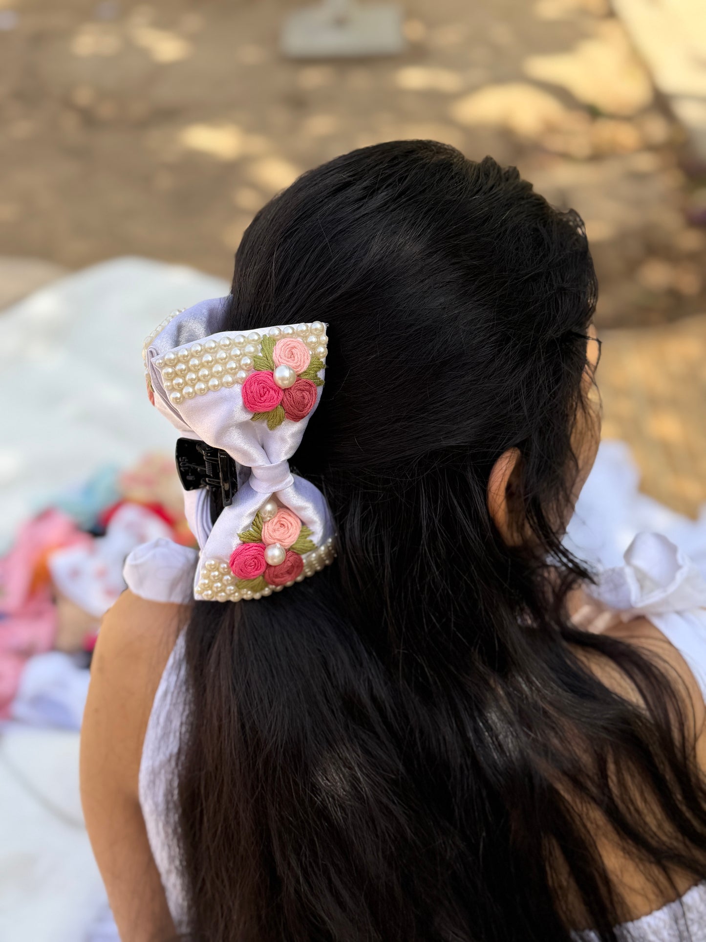 Snowwhite’s Hand Embroidered Clutcher Bow