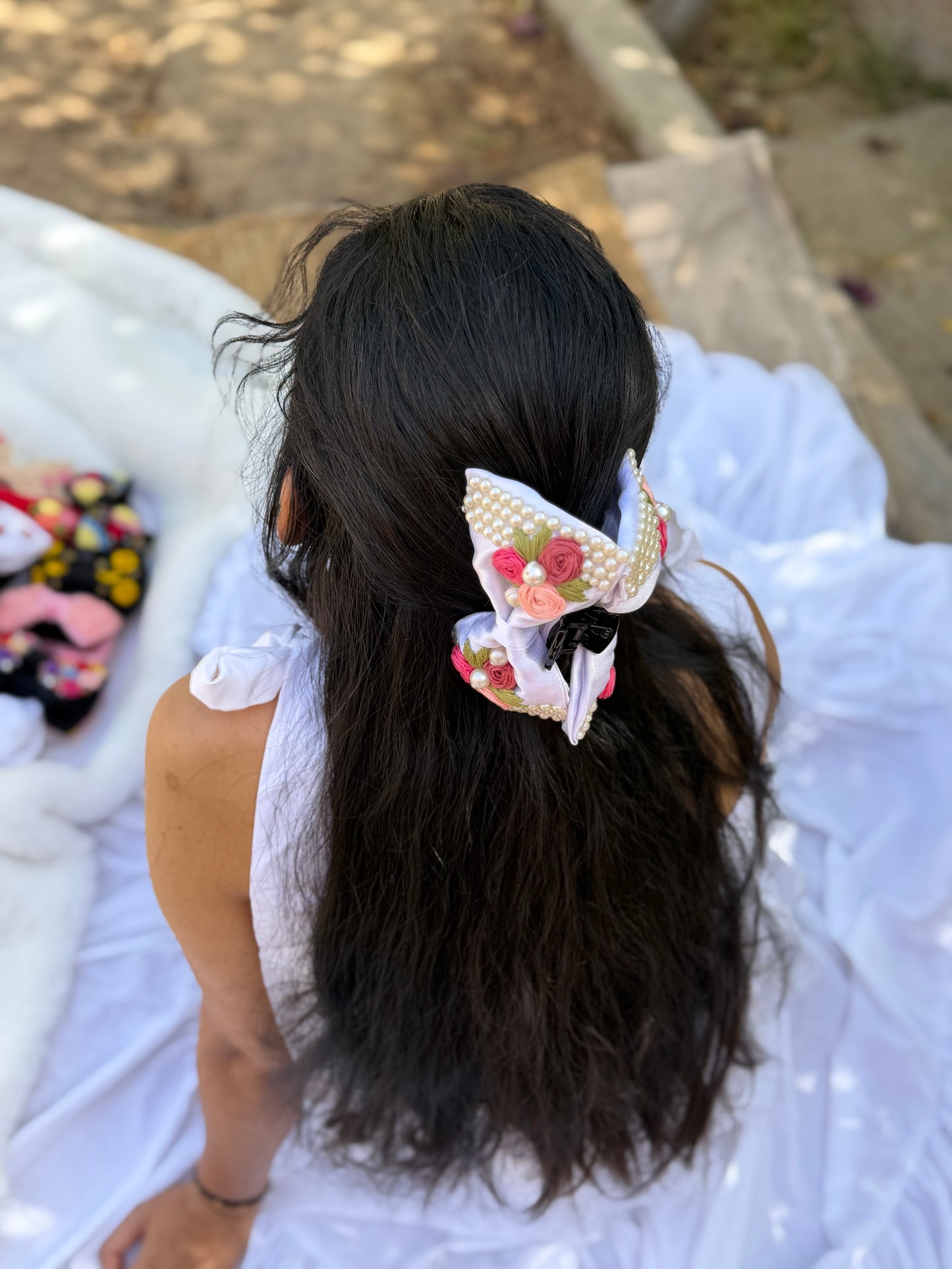 Snowwhite’s Hand Embroidered Clutcher Bow