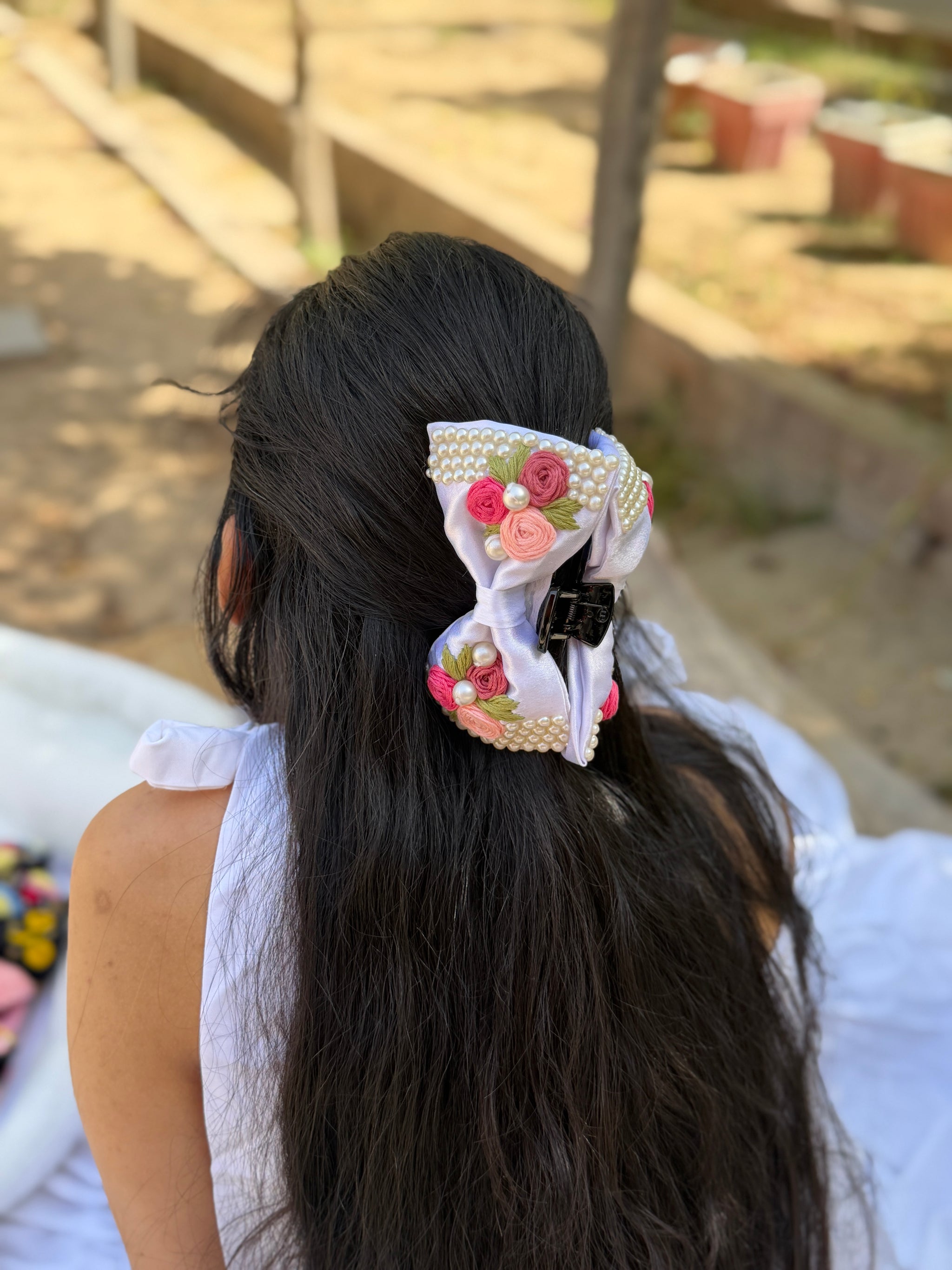 Snowwhite’s Hand Embroidered Clutcher Bow