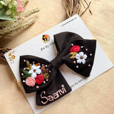 Little Night Garden Hand Embroidered Toddler Bow Hair Tie – Black Floral Rubber Band